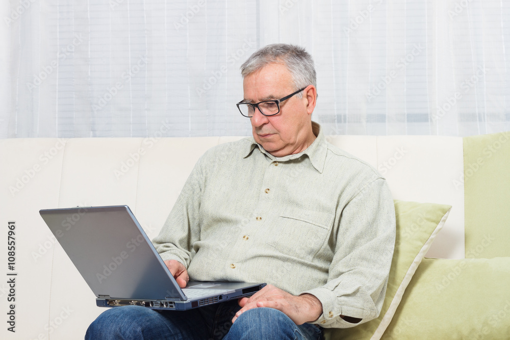 Senior man using laptop. Senior man using laptop.