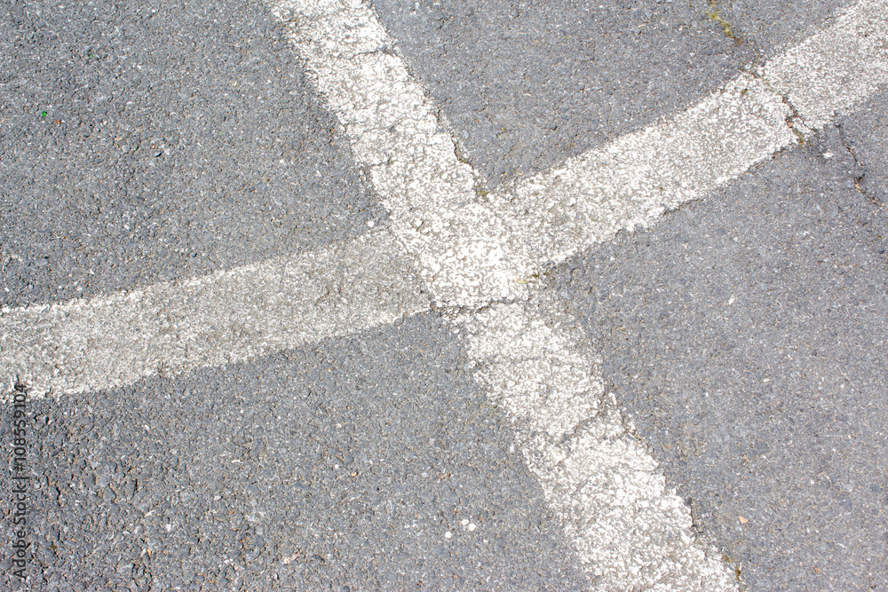 white lines on asphalt
