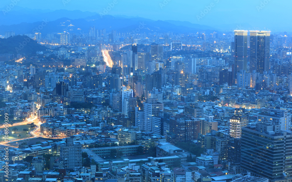 Obraz premium Panoramic night scene of Taipei downtown, View from Taipei 101 ~ A Blue and Gloomy Night in Taipei ~ Aerial view of Taipei City in dusktower !