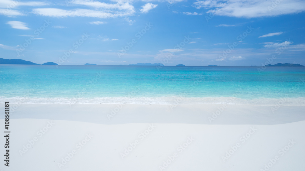 blue sea and white sand beach