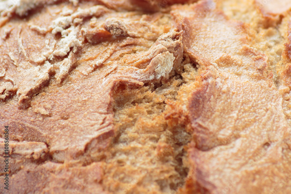 Cracked rye bread crust close up