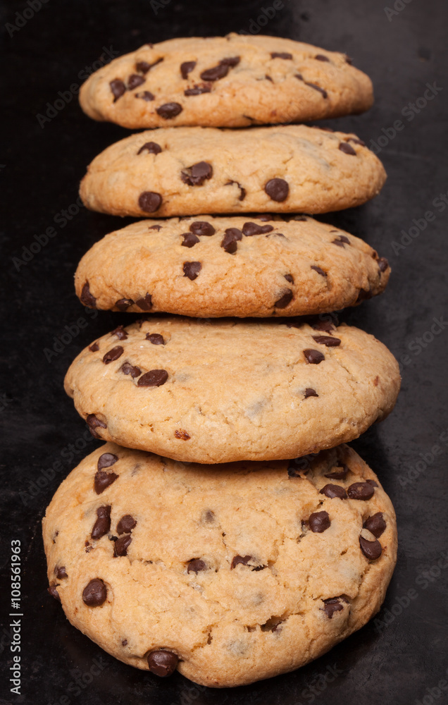 American cookies with chocolate drops on a black background