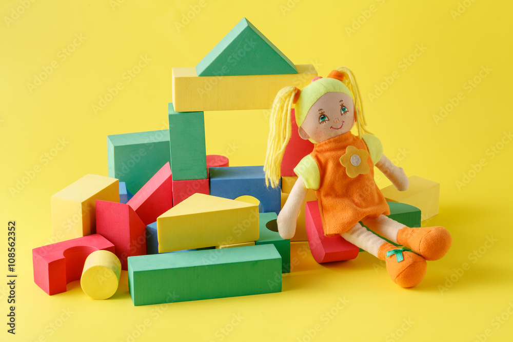 Toy house and doll with blocks Toy house and doll with blocks