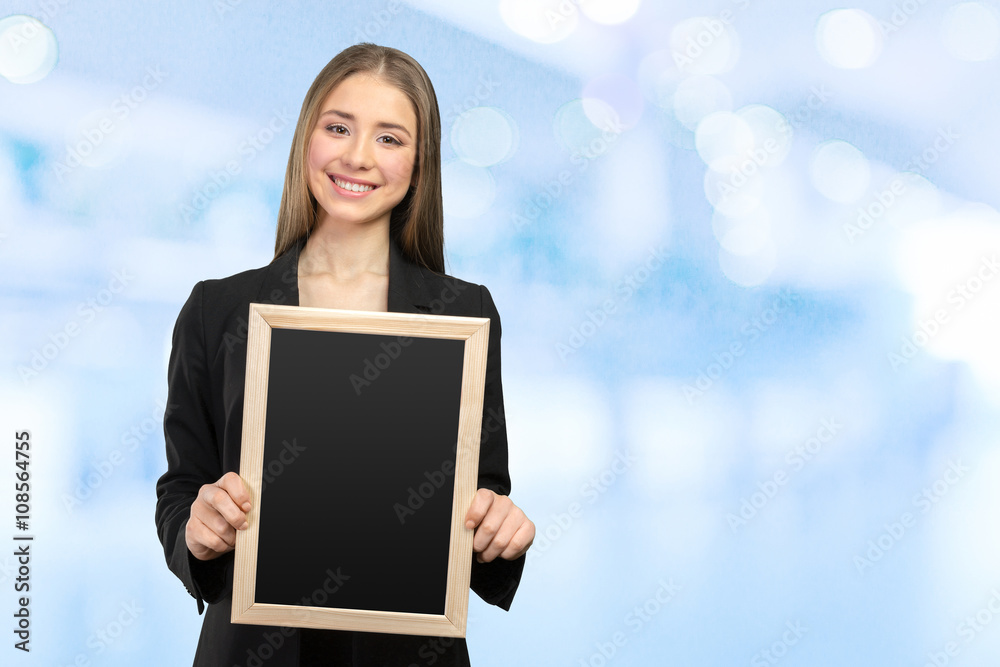 Beautiful happy smiling woman showing copy space