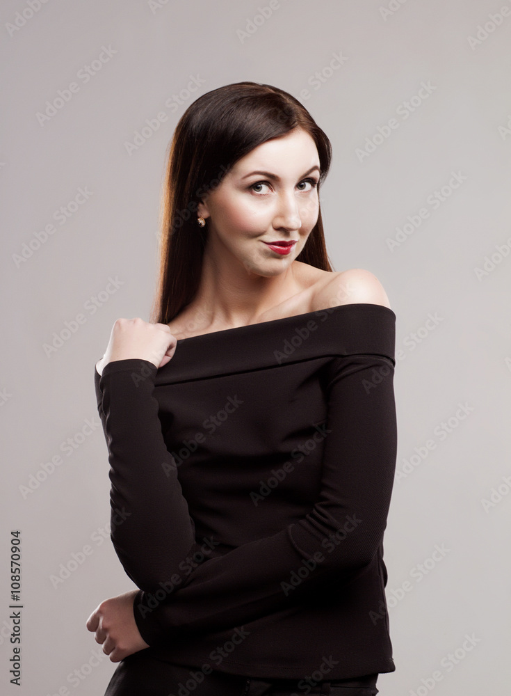 Fototapeta premium Portrait of beautiful Brunette in the Studio
