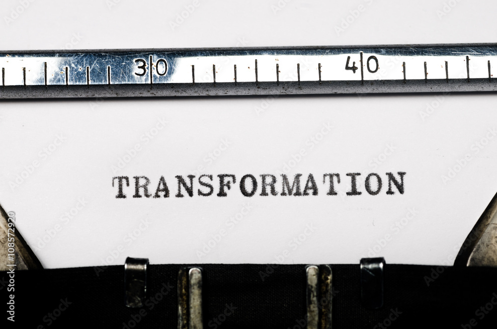 word transformation typed on typewriter