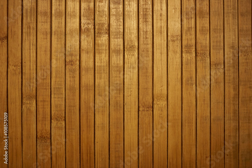 Shield with a large number of parallel wooden logs texture. Wood blinds.
