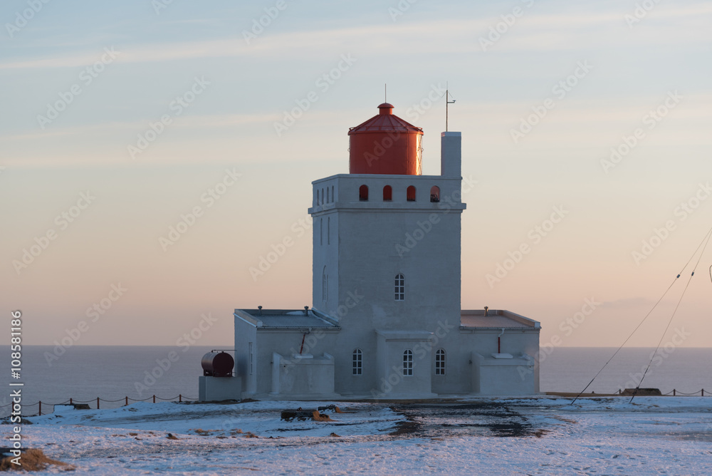 Lighthouse at Dyrholaey during sunset, Iceland