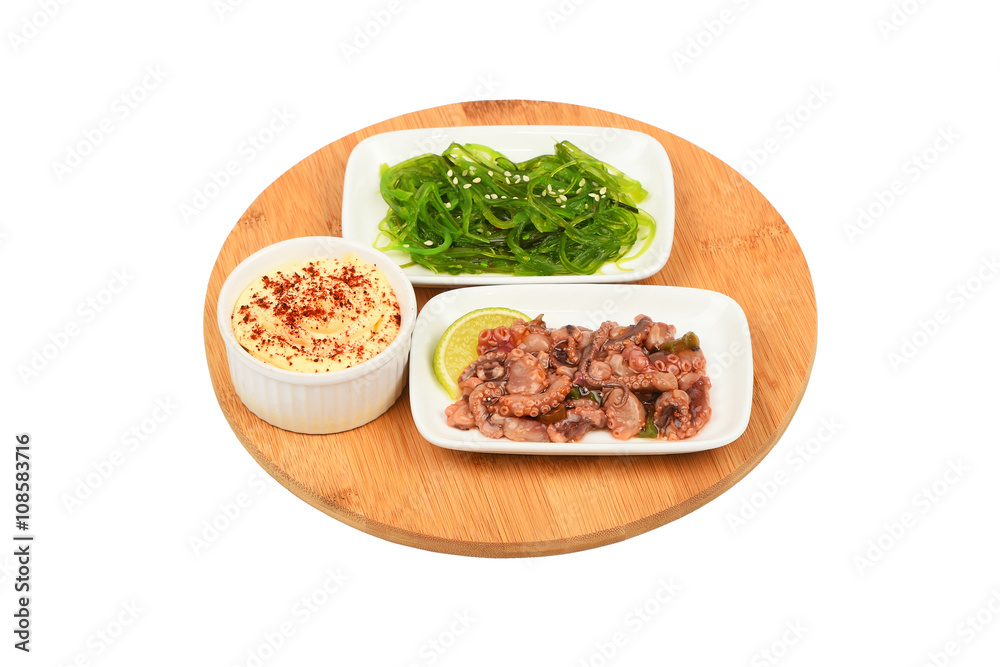 Two seafood salads on wooden plate Two seafood salads on wooden plate