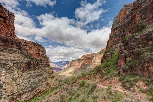 AZ-Grand Canyon National Park-S Rim-Bright Angel Trail. Spectacular cloud formations and scenery envelope the hiker!