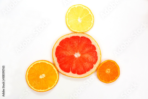 cut across different fruit on white background