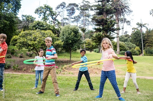 Children playing with hula hoops
