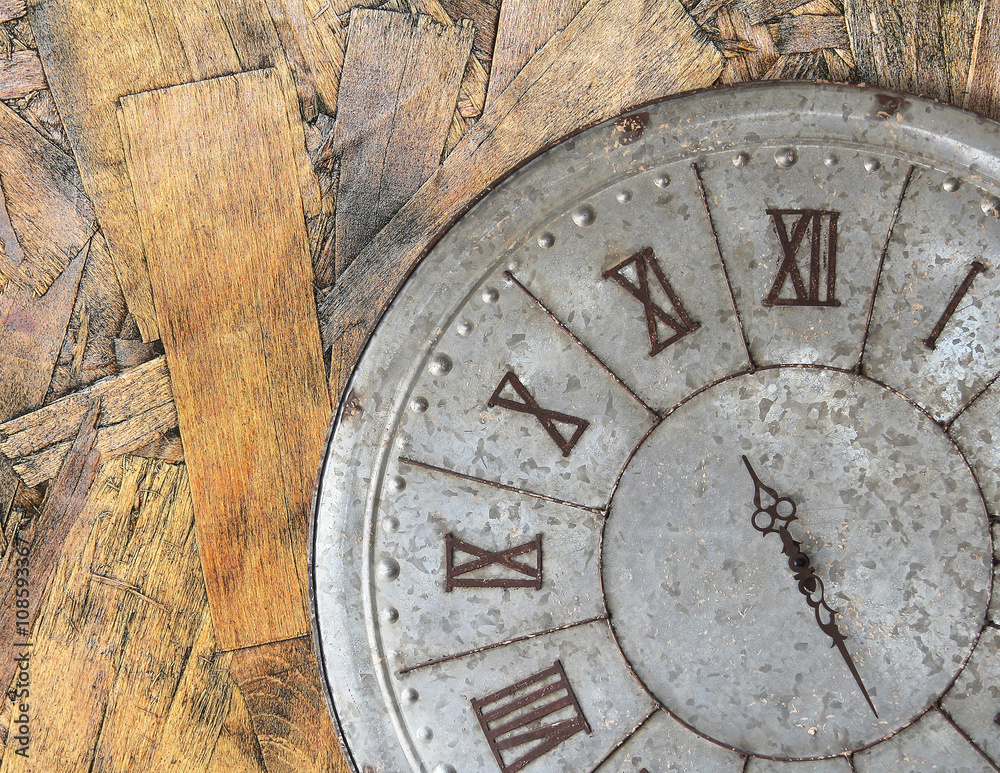 Wall clock old rusty grunge on wooden wall background, (with clipping path)