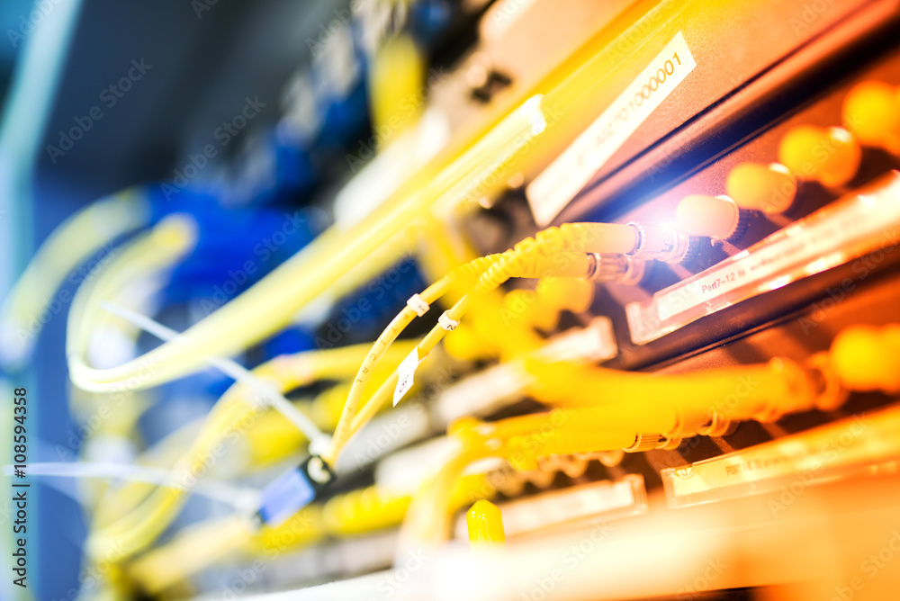 fiber optic with servers in a technology data center fiber optic with servers in a technology data center