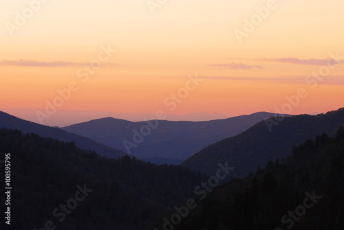 mountain and valley in mist under sunset twilight © nd700