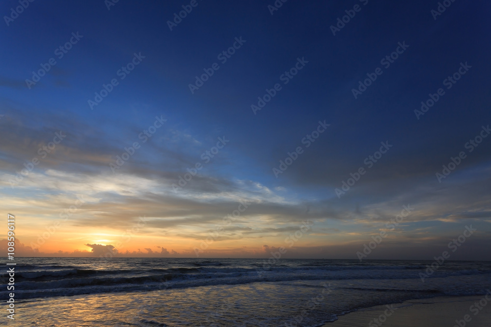 sunset dramatic sky with colorful cloud on sea