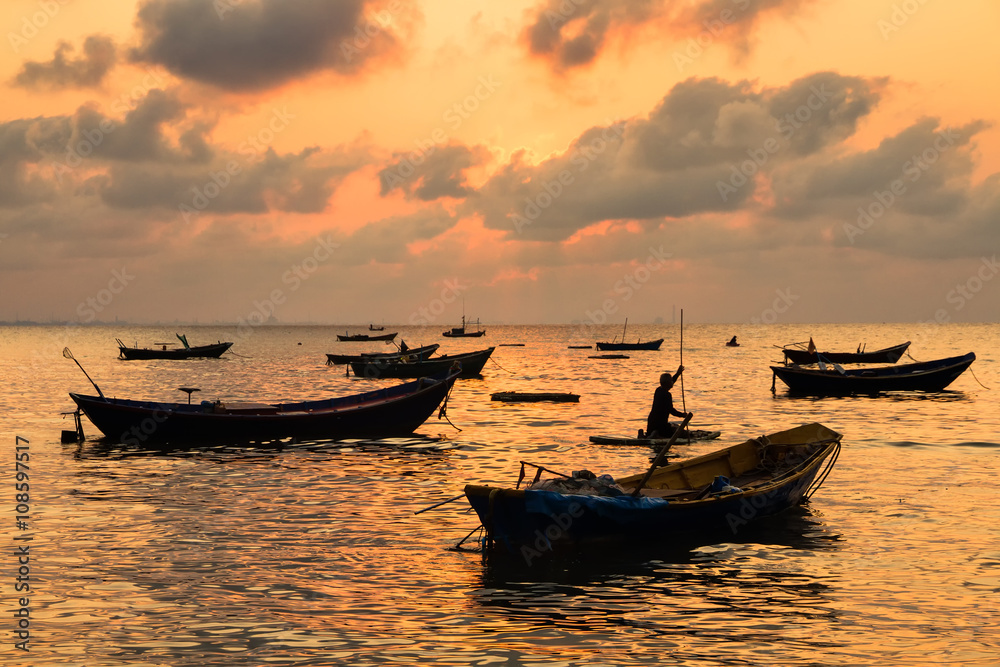 Fishing boats, small boats floating in the sea at sunrise, Conce