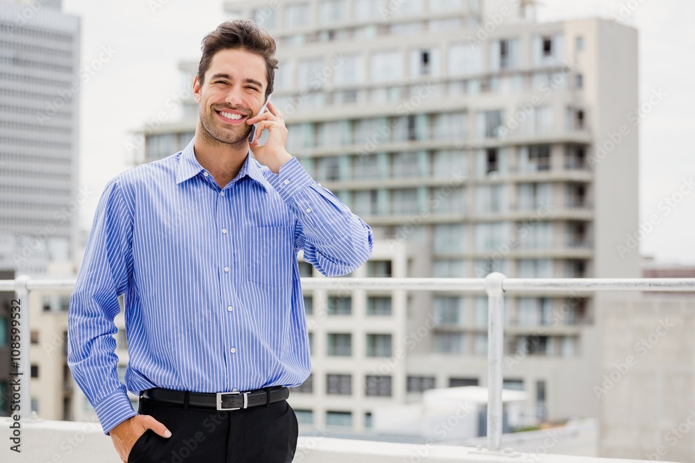 Businessman talking on mobile phone Businessman talking on mobile phone