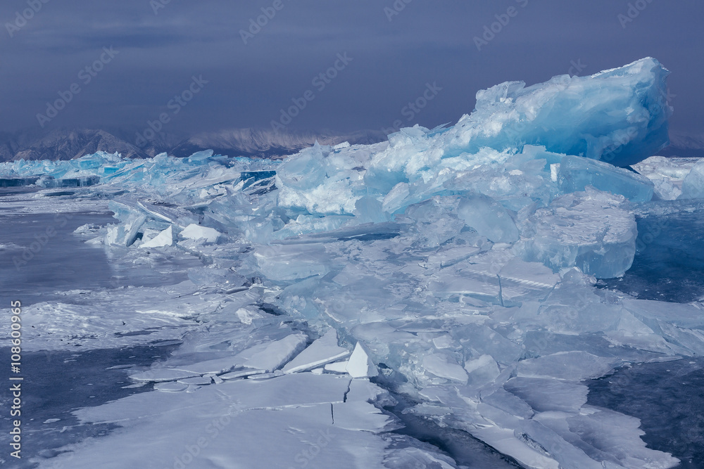 Large blocks of ice crack.