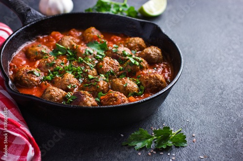 beef  meatballs with tomato sauce in pan