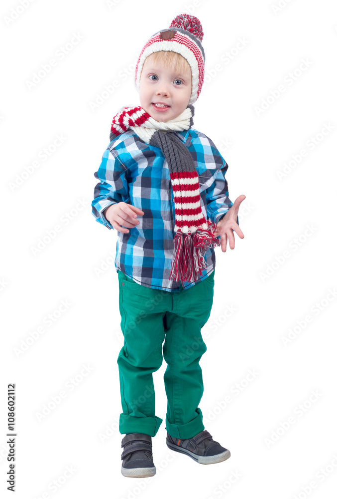 Cute little boy in knitted hat and scarf Cute little boy in knitted hat and scarf