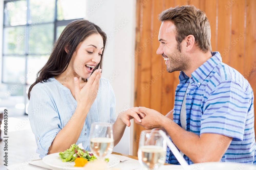 Man gifting finger ring to her woman Man gifting finger ring to her woman