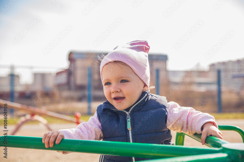 Little girl having fun in amusement park Little girl having fun in amusement park