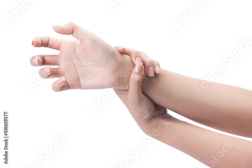 Acute pain in a woman palm, a woman massaging her painful hand isolated with clipping path © Ratthaphon Bunmi