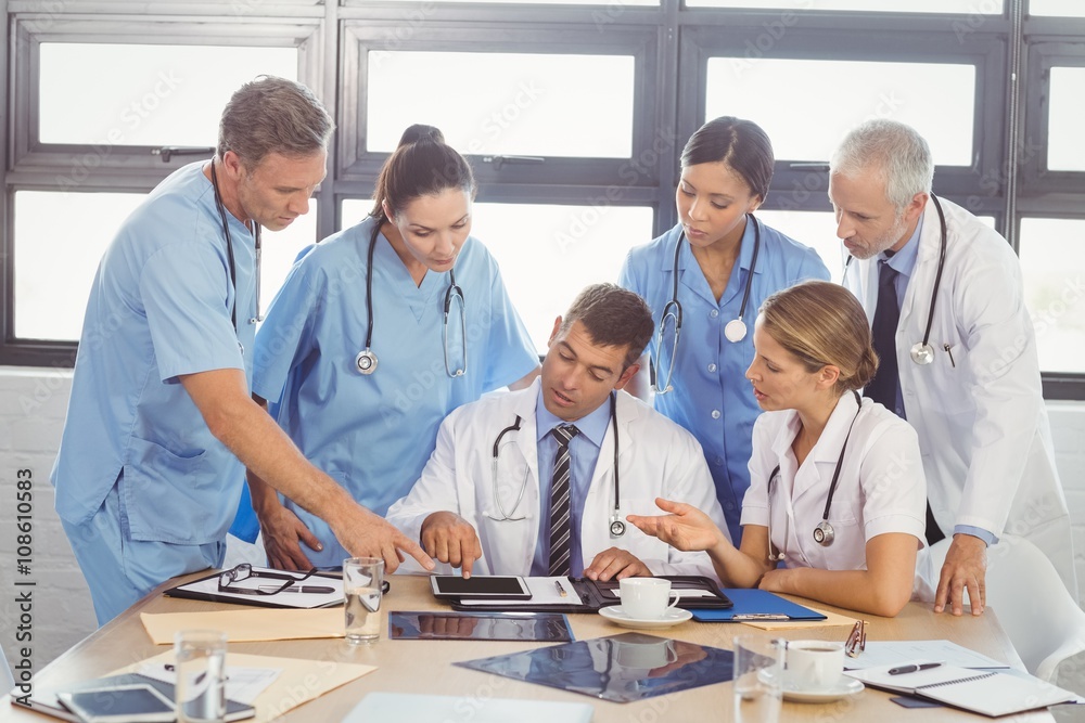 Medical team interacting in conference room