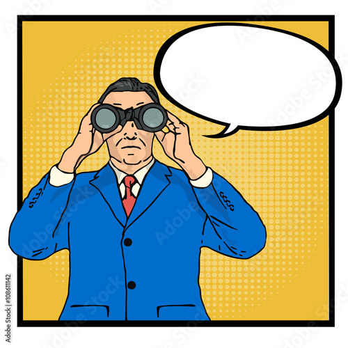 Businessman looking through binoculars.