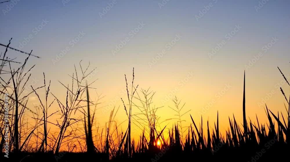 Time lapse of colorful at days end revealing brilliant blue and orange colors Time lapse of colorful at days end revealing brilliant blue and orange colors