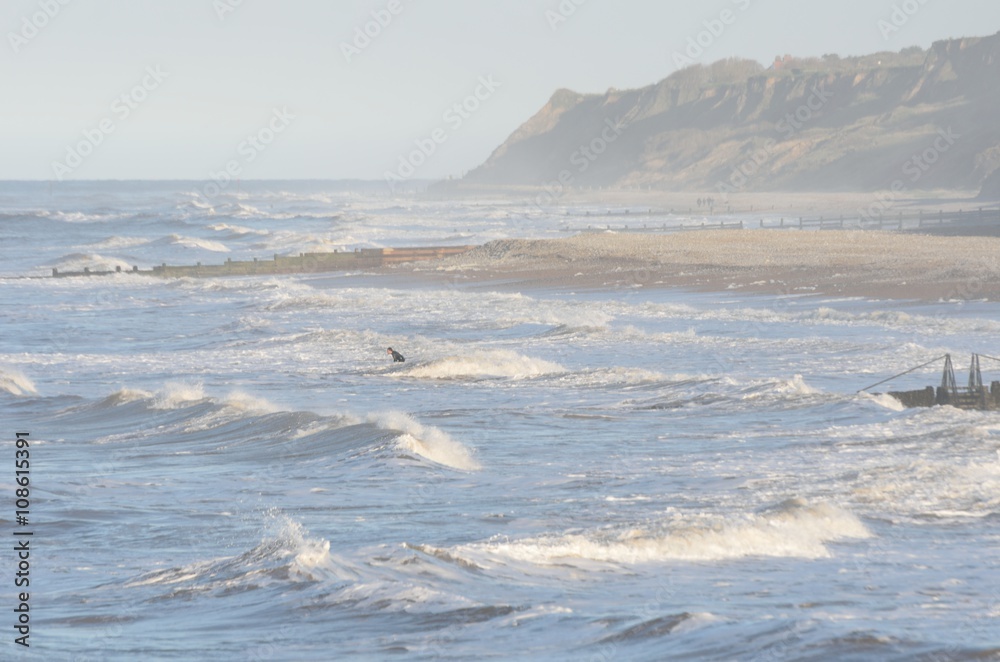 Lone Surfer on rough sea