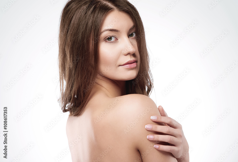 Portrait of natural woman in the studio