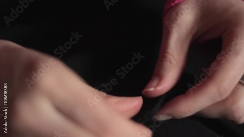 Wallpaper Mural girl with needle manually sews their clothes Torontodigital.ca