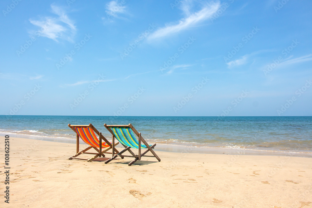 Deckchair, chair on the beach in sunshine day.