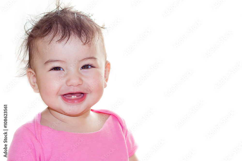 the child smiles and laughs on a white background the child smiles and laughs on a white background