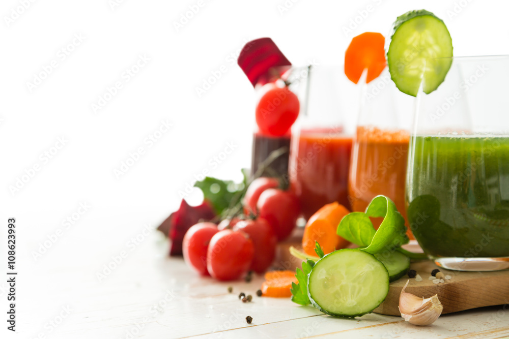 Selection of colorful vegetable juice in glasses Selection of colorful vegetable juice in glasses