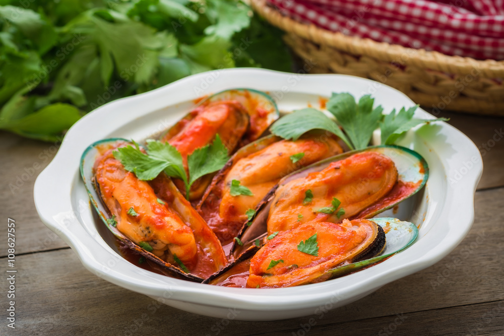 Mussels in tomato and herbs sauce Mussels in tomato and herbs sauce