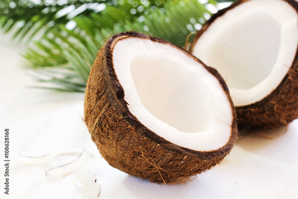 Fresh coconut cut in half, selective focus Fresh coconut cut in half, selective focus