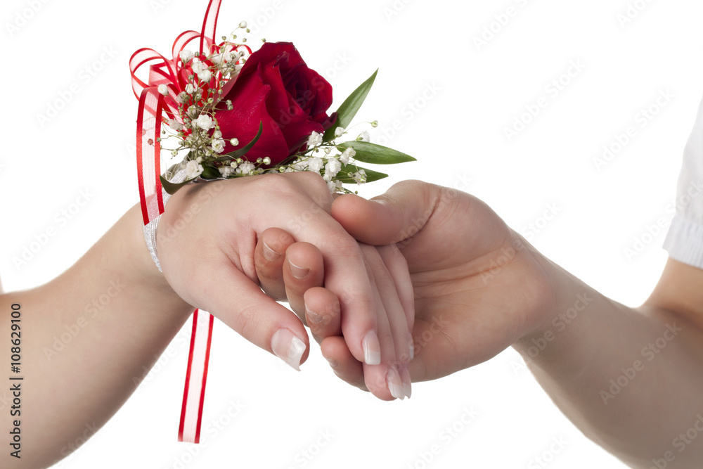 a lady with red rose corsage