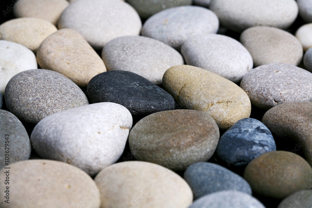 Sea stones background, black and white pebble texture Sea stones background, black and white pebble texture