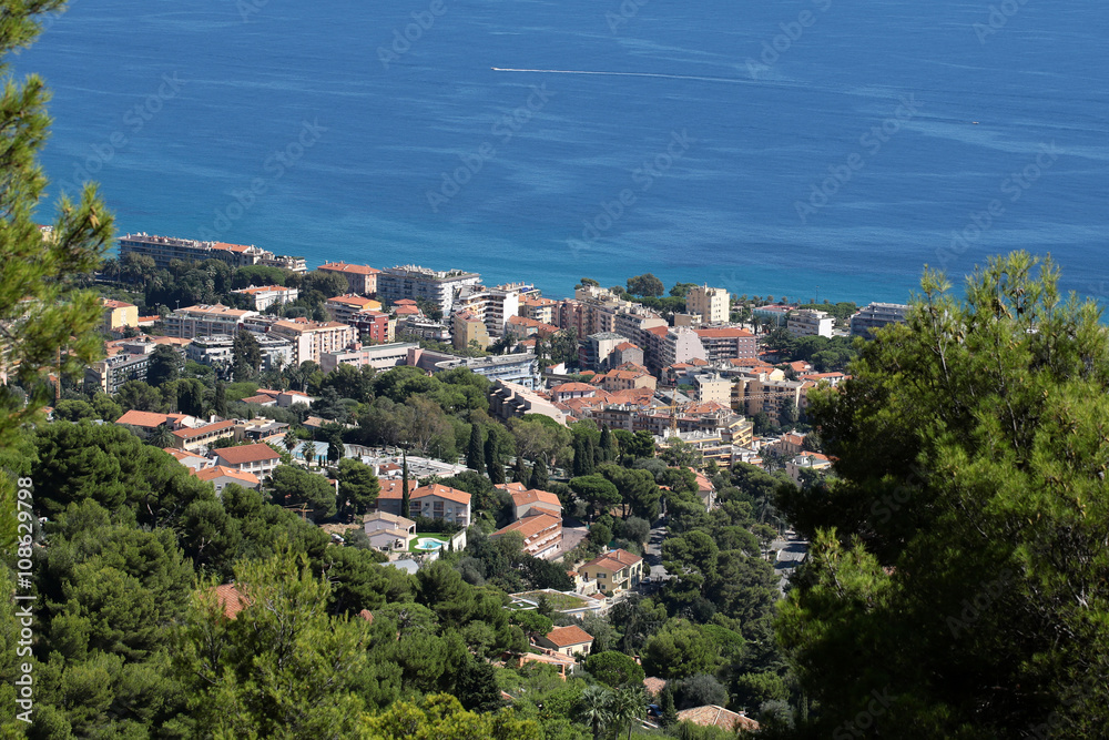 City coastline on blue sea