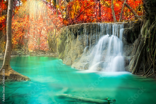 Fototapeta Naklejka Na Ścianę i Meble -  Waterfall in autumn forest at Erawan waterfall National Park, Thailand 