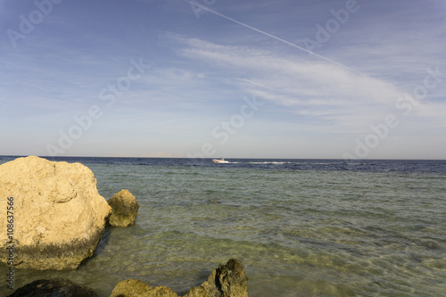 Sea and colorful clouds on a sky
