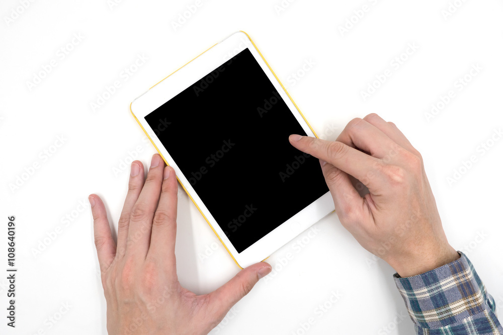 Male hands with a white tablet touch computer gadget with touch blank black screen on white background. Male hands with a white tablet touch computer gadget with touch blank black screen on white background.