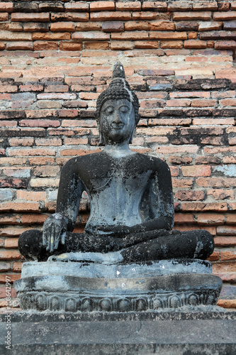 Old buddha statue in Sukhothai Historical Park.