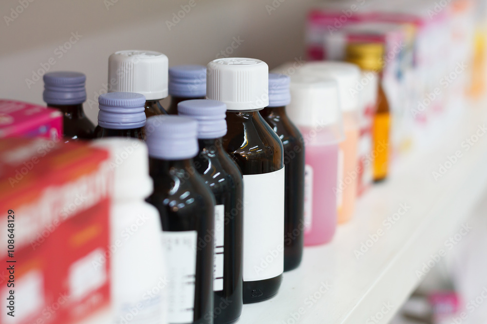 medicine bottles in the pharmacy medicine bottles in the pharmacy