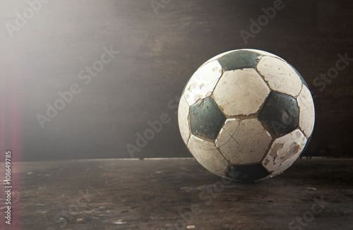 Old Soccer football on old vintage wood table,morning light © showcake
