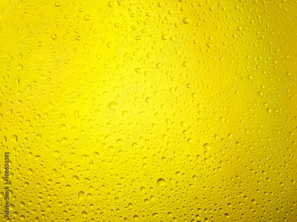 Water droplets on the glass with a Yellow illumination Water droplets on the glass with a Yellow illumination