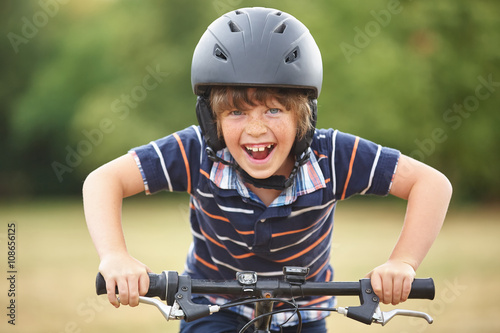Kid with bike and helmet